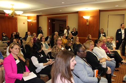 Attendees engaged in Casey Carpenters presentation.
